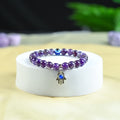 HindCraft Amethyst Evil Eye Bracelet with Hamsa Charm for Balance