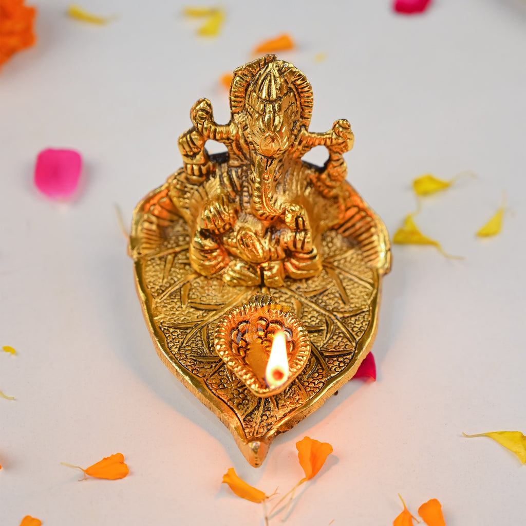 HindCraft Metal Lord Ganesha Idol on Leaf with Diya for Home & Puja Décor