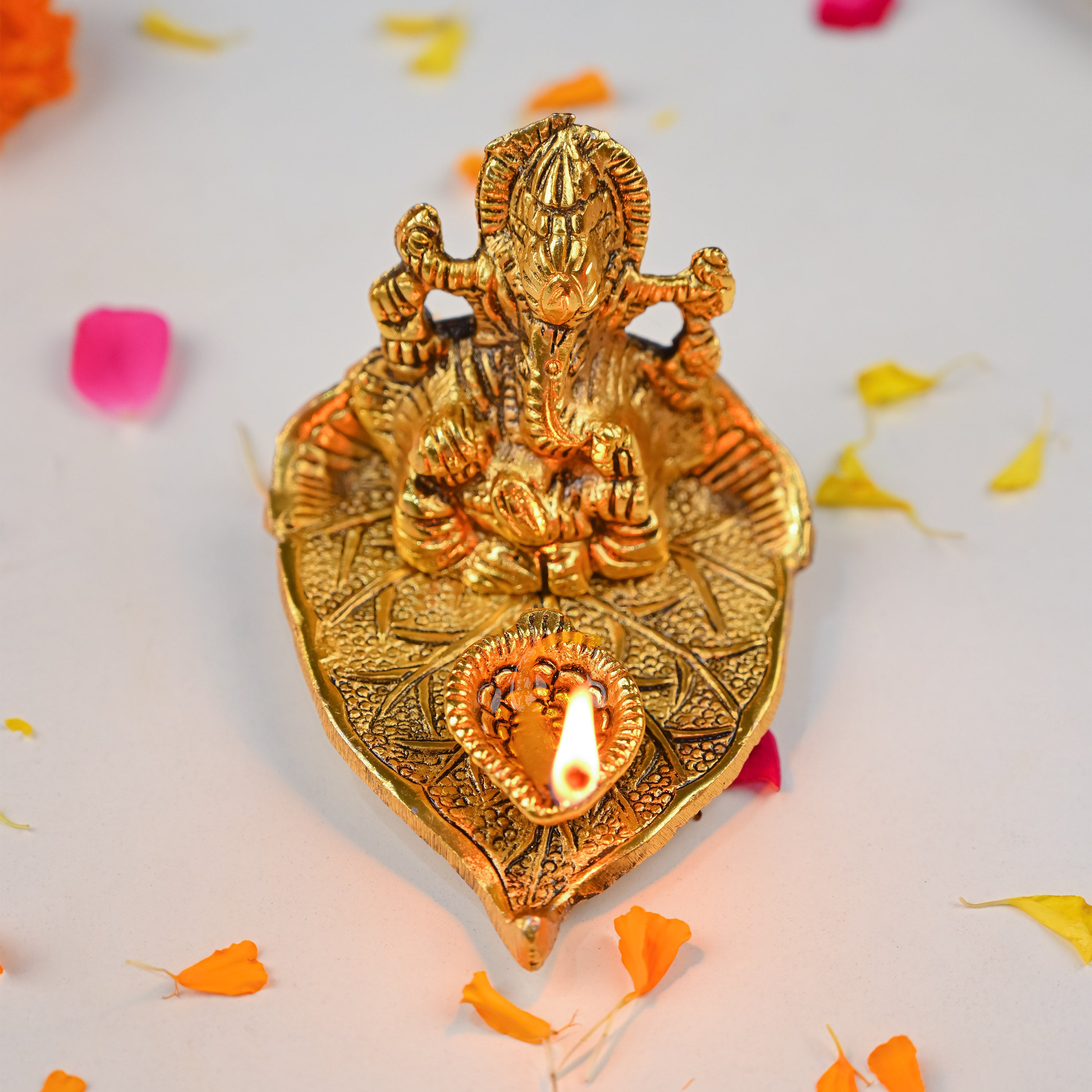 HindCraft Metal Lord Ganesha Idol on Leaf with Diya for Home & Puja Décor