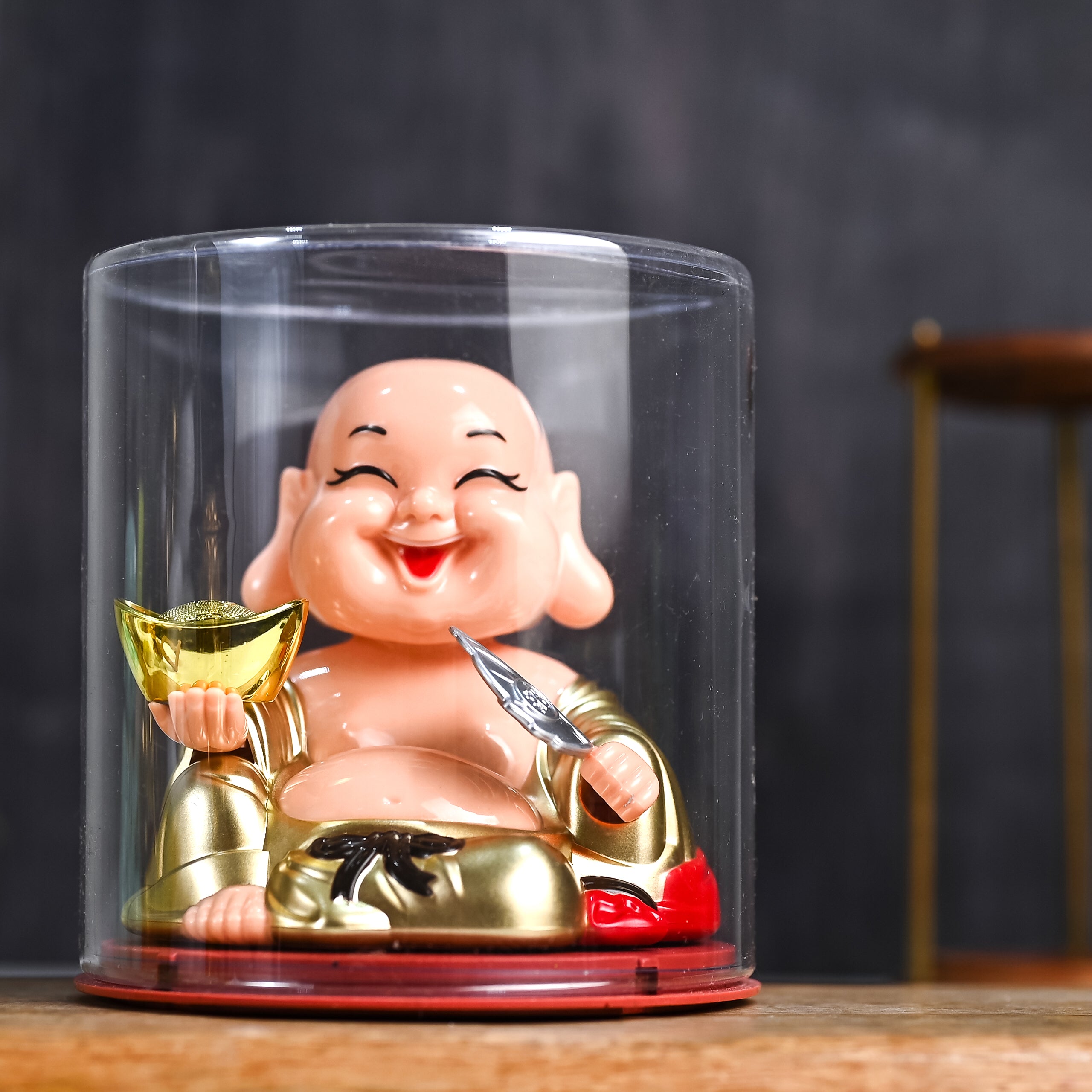 HindCraft Laughing Buddha Showpiece with Gold Ingot in Transparent Display Case